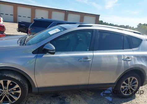 2018 Toyota Rav4 Limited z USA, uszkodzony, nr VIN JTMYFREVXJD112924